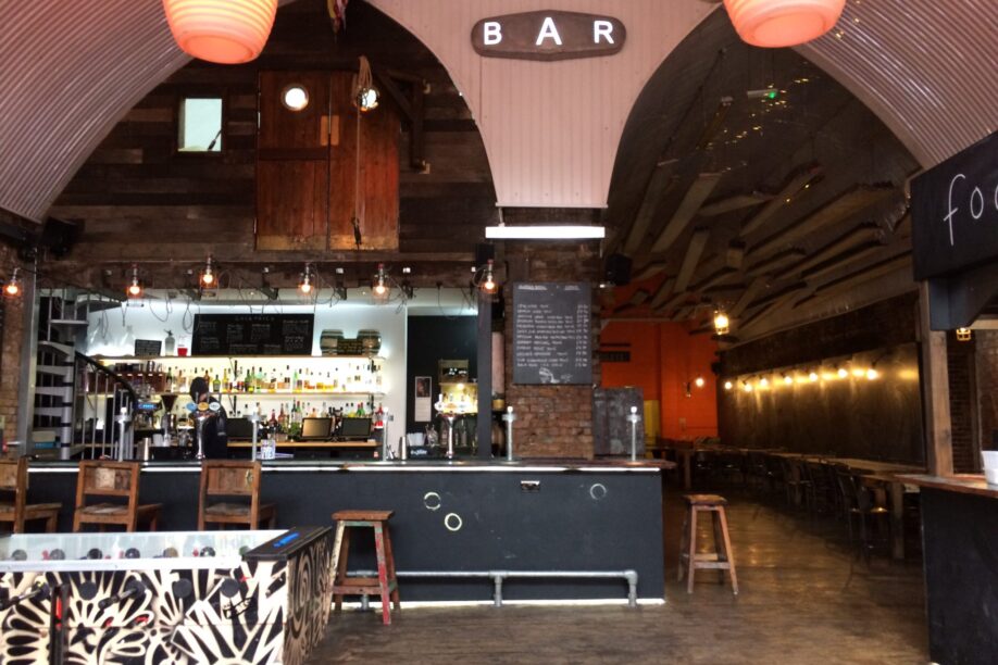 Versatile warehouse bar arches space
