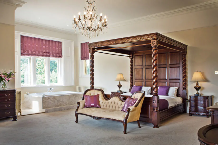 Traditional spacious four poster bedroom