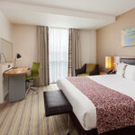 Spacious comfortable bedroom modern amenities